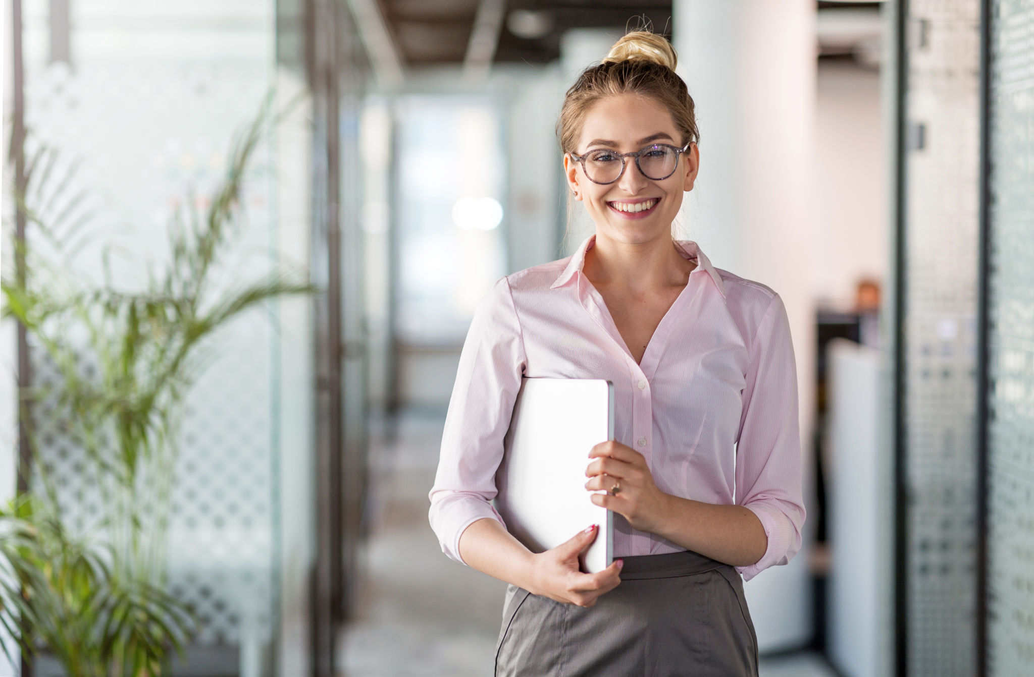 Portrait of a young business woman in an office